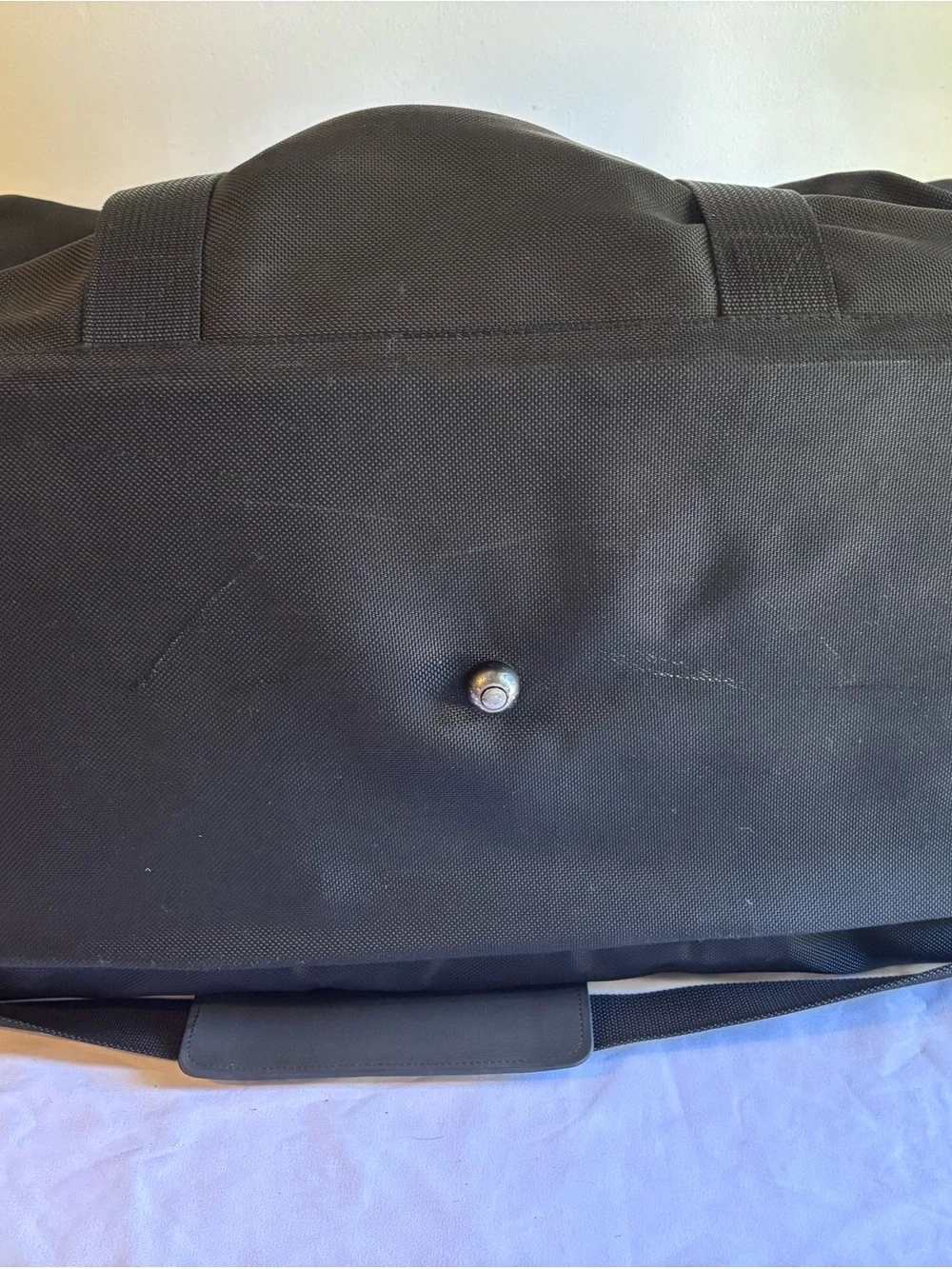 Tumi Black Men's Duffel Bag with Red Logo Tag